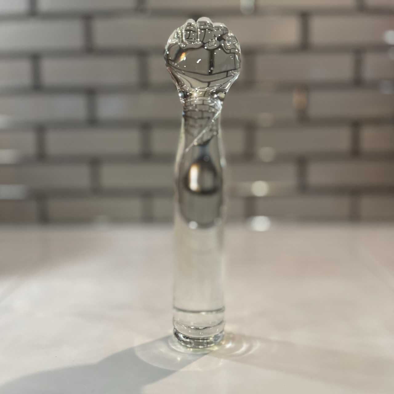 Elegant Solid Glass Fist Decorative Secret Sculpture and Temperature Play Toy